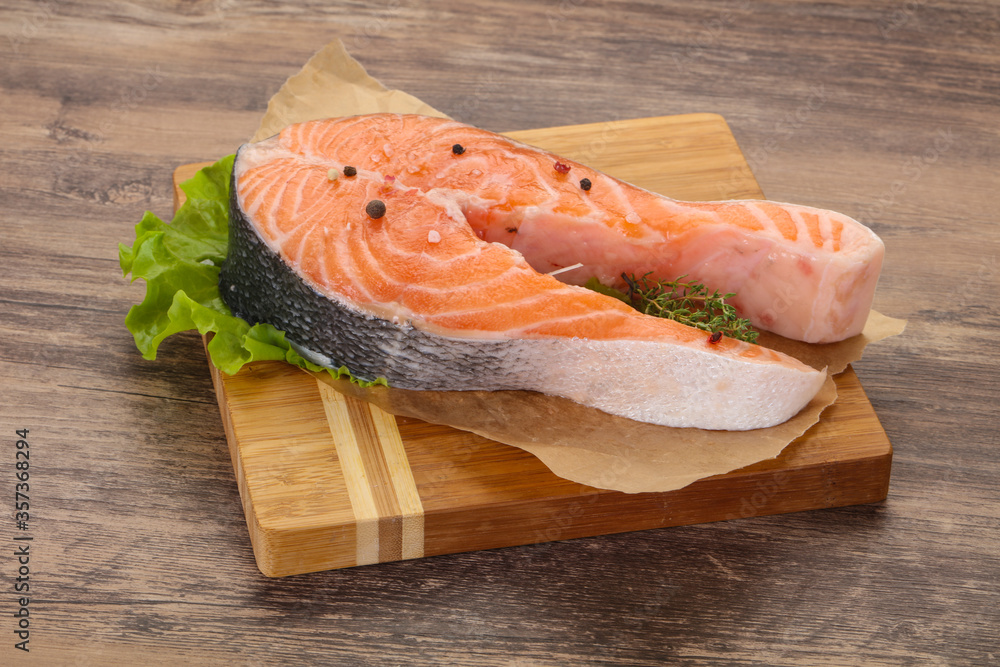 Raw salmon steak - ready for grill Raw salmon steak - ready for grill