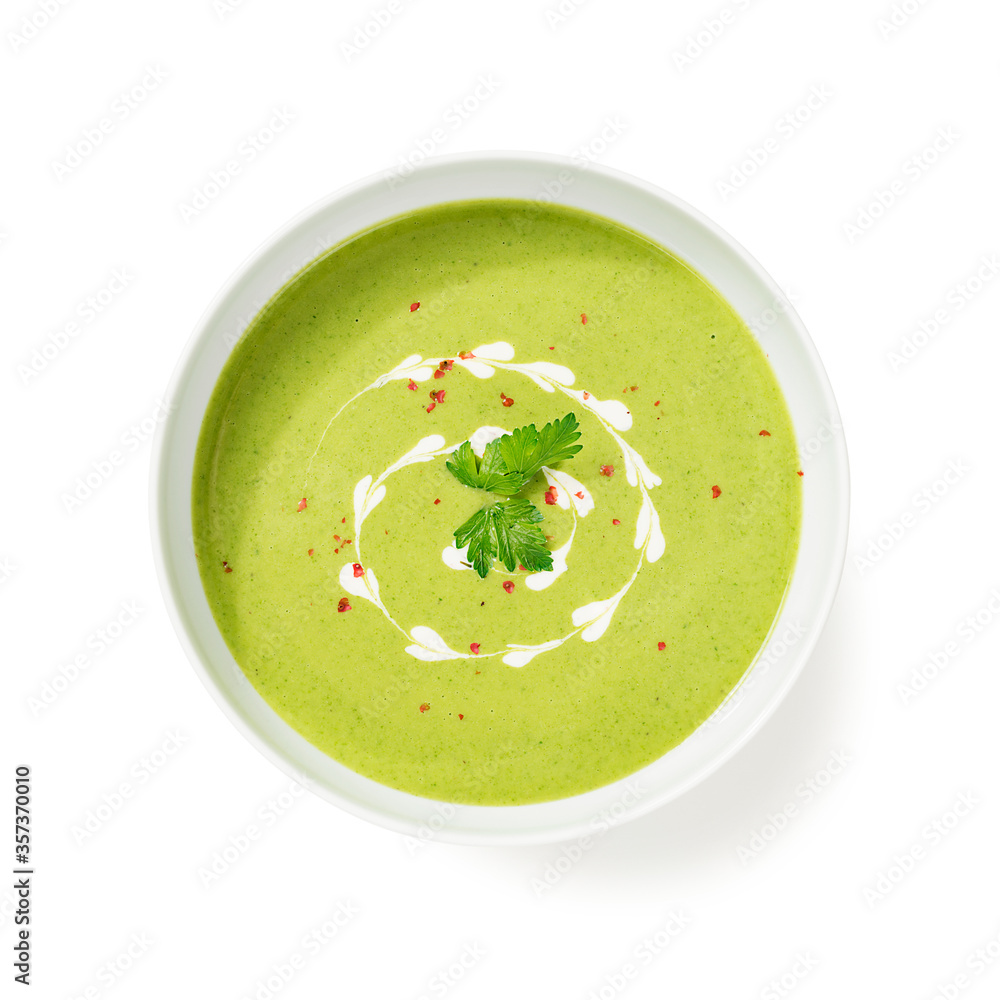 Bowl of green peas cream soup isolated on white background Bowl of green peas cream soup isolated on white background