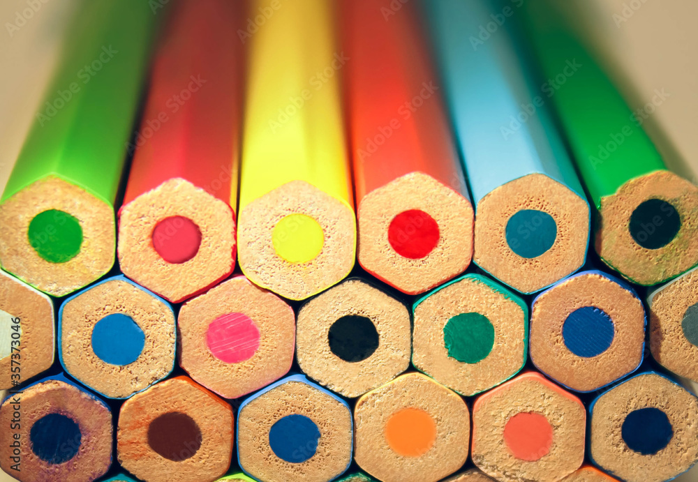 Colored wooden pencils background. Education, creativity Colored wooden pencils background. Education, creativity
