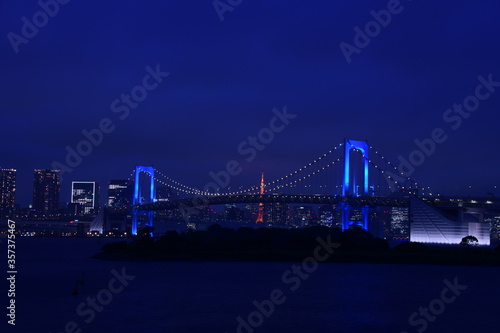 Blue rainbow bridge in Tokyo photo