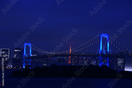 Blue rainbow bridge in Tokyo photo