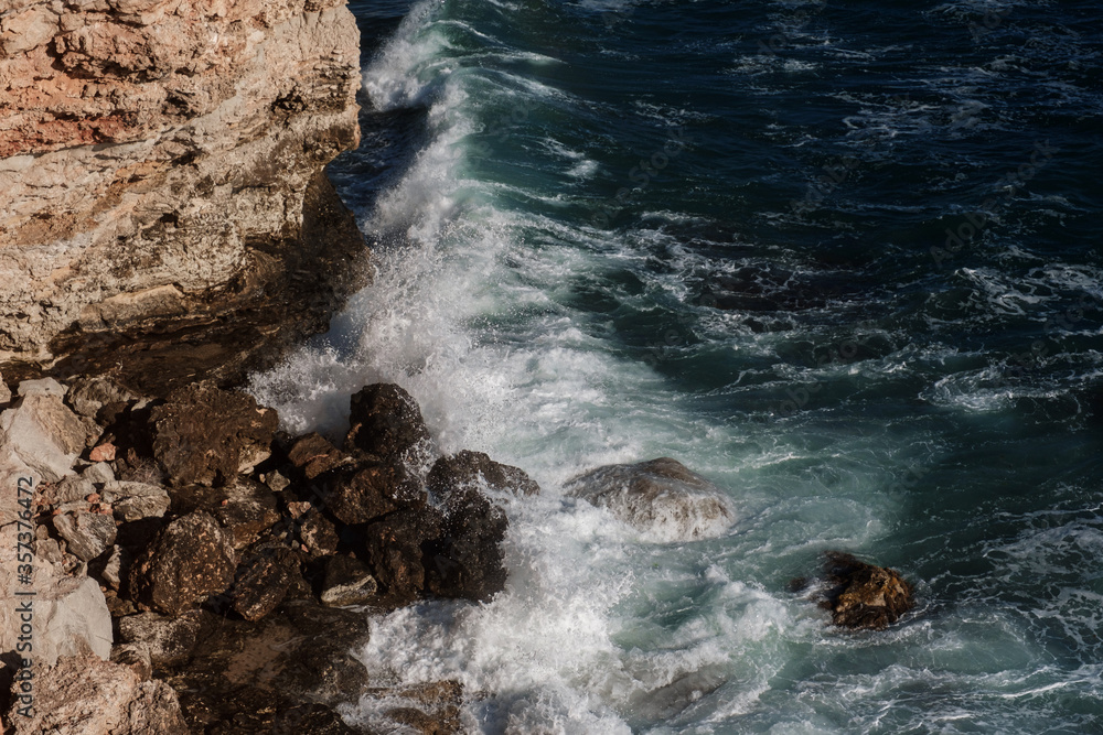 Ocean wave background breaking sea water rocky shore Ocean wave background breaking sea water rocky shore