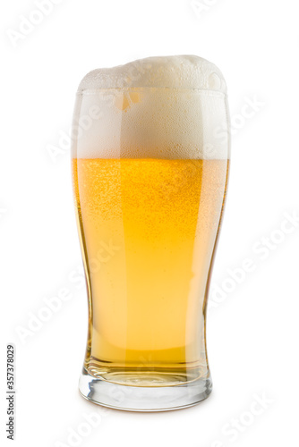 glass of blonde beer with foam, isolated on white background