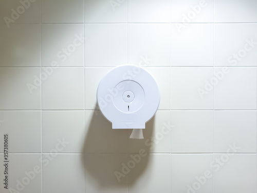 Toilet paper hanging white box.