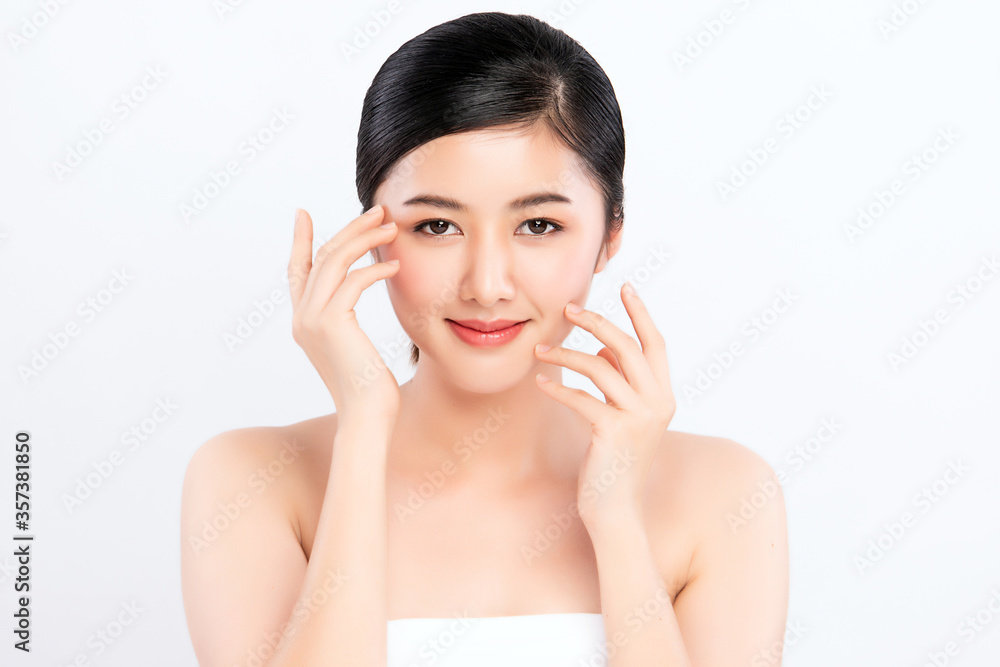 Beautiful Young asian Woman touching her clean face with fresh Healthy Skin, isolated on white background, Beauty Cosmetics and Facial treatment Concept. Beautiful Young asian Woman touching her clean face with fresh Healthy Skin, isolated on white background, Beauty Cosmetics and Facial treatment Concept.