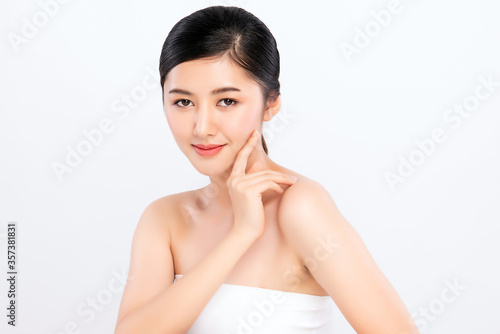 Beautiful Young asian Woman touching her clean face with fresh Healthy Skin, isolated on white background, Beauty Cosmetics and Facial treatment Concept.