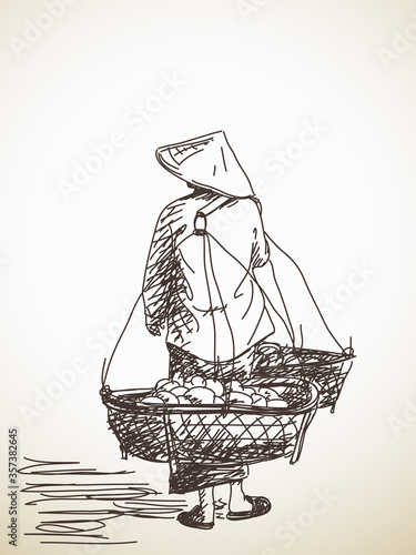 Woman carrying a yoke