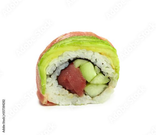 One avacado and tuna sushi roll on white