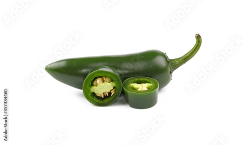 Фотография Close up one cut green jalapeno pepper isolated