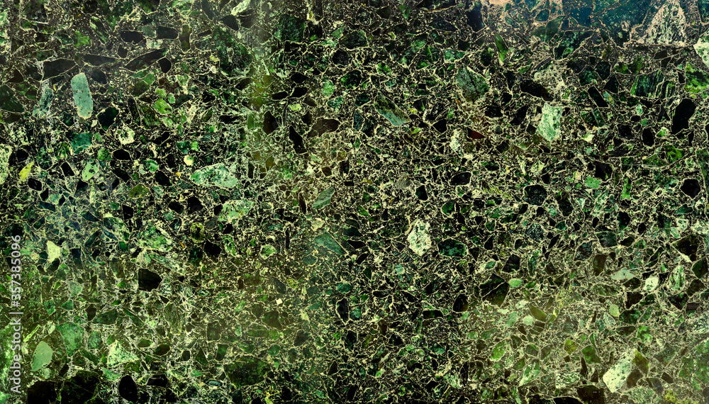 emerald tile with flat surface in green, yellow and black - irregular background texture emerald tile with flat surface in green, yellow and black - irregular background texture