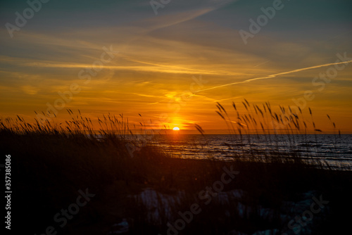 Fototapeta Naklejka Na Ścianę i Meble -  
A beautiful moment of sunset in Latvia by the Baltic Sea