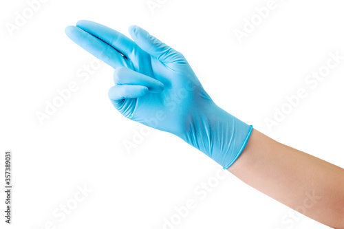 Fototapeta Naklejka Na Ścianę i Meble -  Doctor's hand in sterile medical gloves pointing up isolated on white