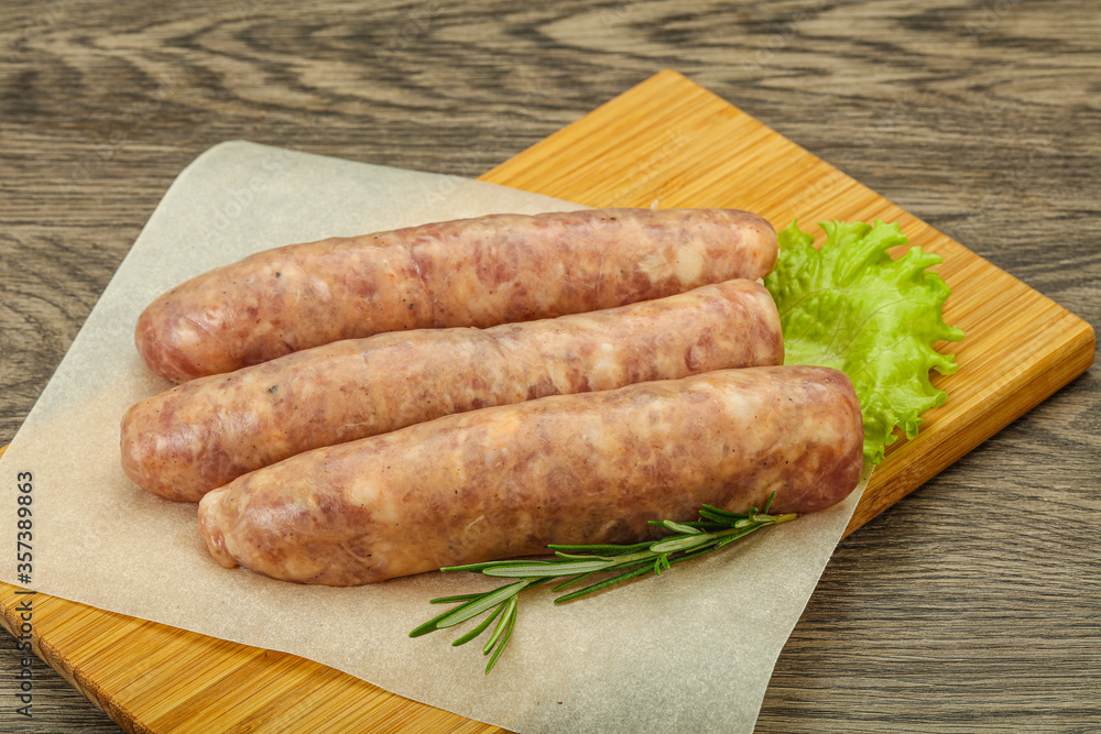 Raw pork meat sausages for grill Raw pork meat sausages for grill