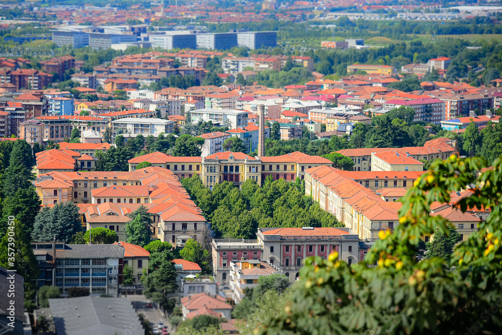 Bergamo,italy, 10/08/2019, view from above of the old and historical hospital of Bergamo (Ospedali Riuniti) and in the background the modern hospital Papa Giovanni XXXIII