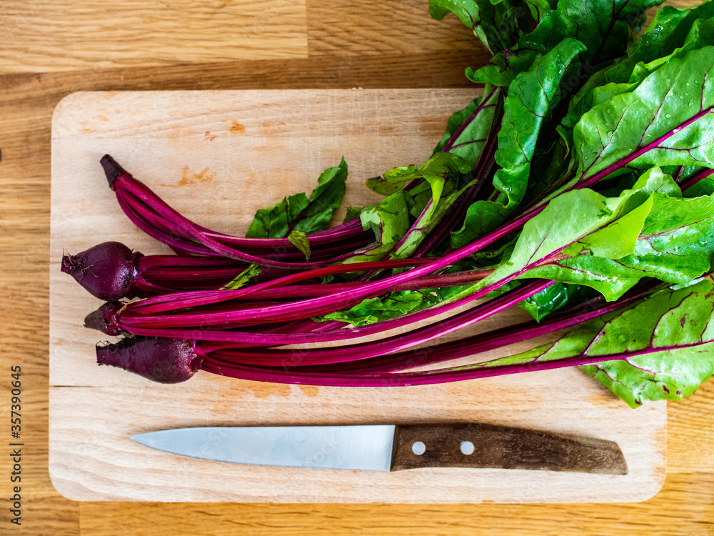 Raw beetroots on cutting board
Raw beetroots on cutting board