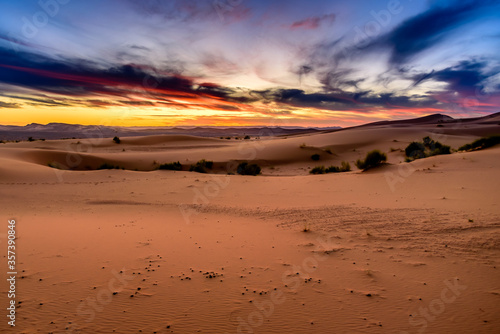 Dramatic and colorful sunset at The Sahara desert  Earth s Largest Hot Desert