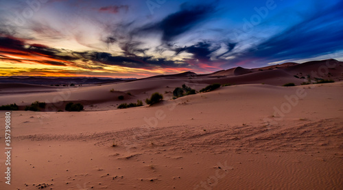 Dramatic and colorful sunset at The Sahara desert: Earth's Largest Hot Desert