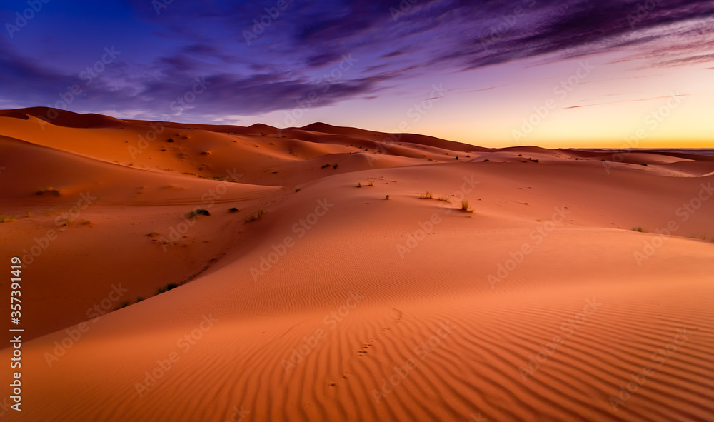 Dramtic and colorful sunrise at the Sahara desert:  Earth's Largest Hot Desert