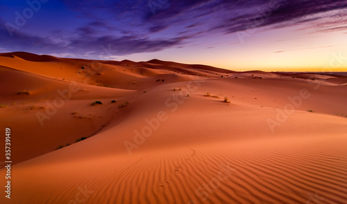 Dramtic and colorful sunrise at the Sahara desert   Earth s Largest Hot Desert