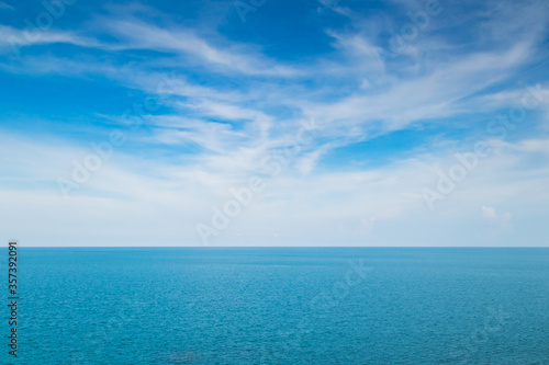 White fluffy clouds and turquoise sea on blue sky © Axl4Real