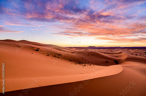 Dramtic and colorful sunrise at the Sahara desert: Earth's Largest Hot Desert
