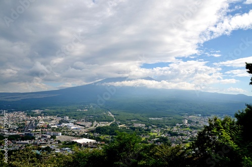 View towards cloud covered mount Fuji over Kawaguchi town, Japan