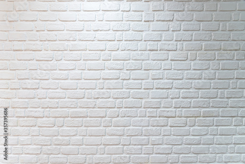 White brick wall for background. 