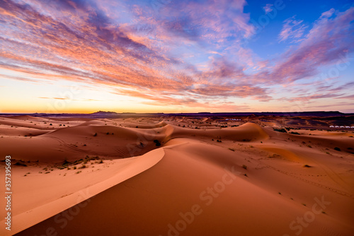 Dramtic and colorful sunrise at the Sahara desert  Earth s Largest Hot Desert