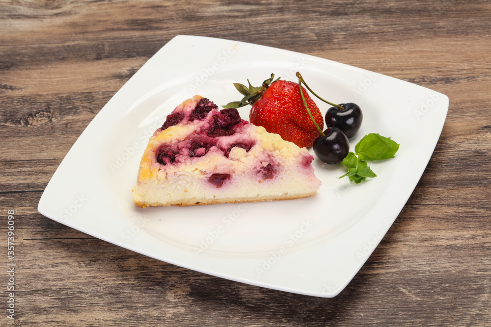 Cheesecake with cherry served strawberry Cheesecake with cherry served strawberry