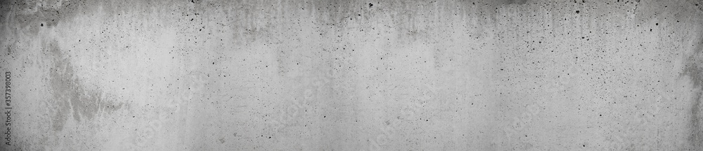 Obraz premium grunge concrete texture in old retro grey long format as panorama with dots holes and scratches in wall