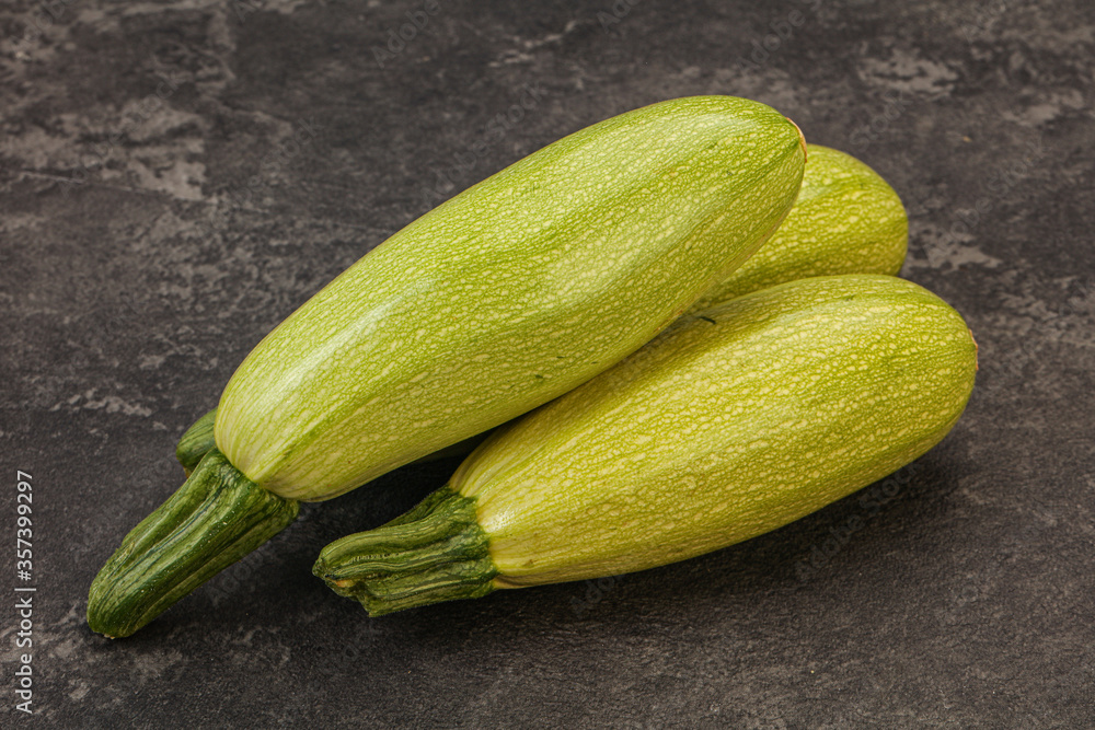 Young tasty zucchini over board Young tasty zucchini over board