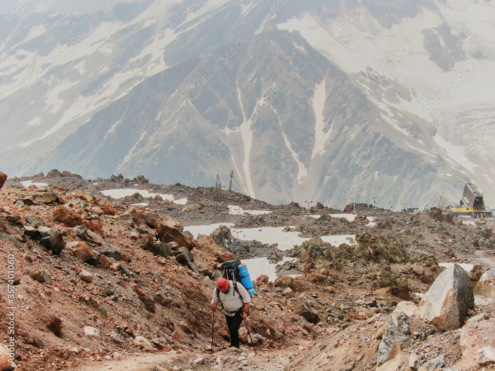 The One traveler conquers Mount Elbrus. Beautiful landscape, sports tourism.