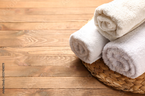 Cotton towels on wooden background