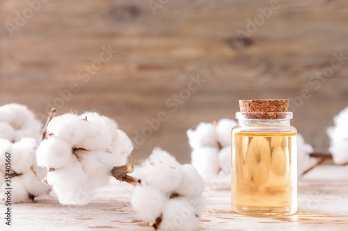 Bottle of cottonseed oil on table photo