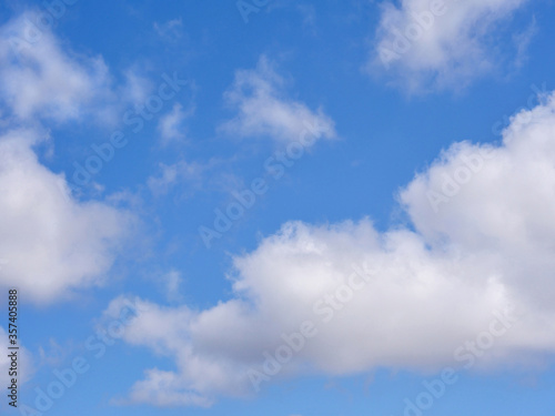 blue sky and white fluffy cloud fresh ozone in morning of sunny day / cloudscape backdrop and background