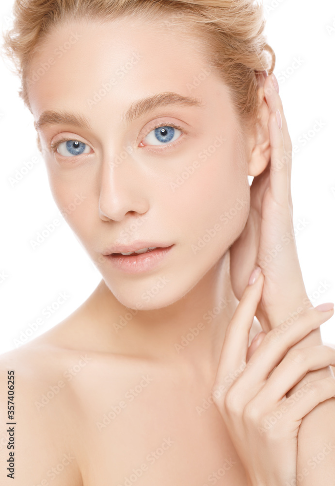 Vertical shot of woman face with blue eyes looking at camera and touching her neck, isolated on white background. Beautiful model girl with perfect clean fresh skin Vertical shot of woman face with blue eyes looking at camera and touching her neck, isolated on white background. Beautiful model girl with perfect clean fresh skin