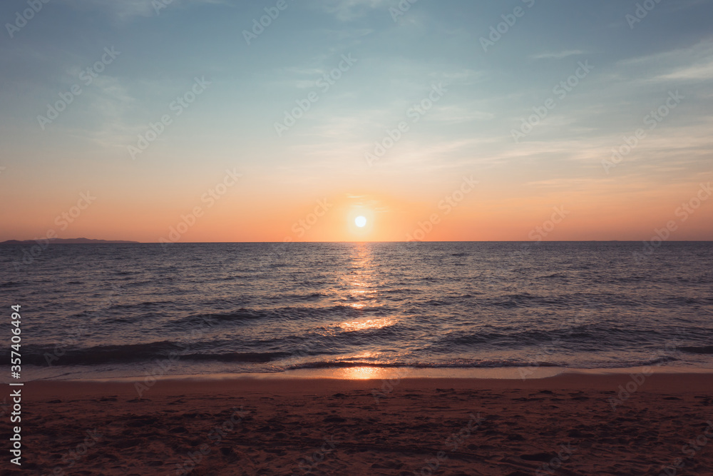 Sunset at the beach in the evening Holiday and Travel Concept