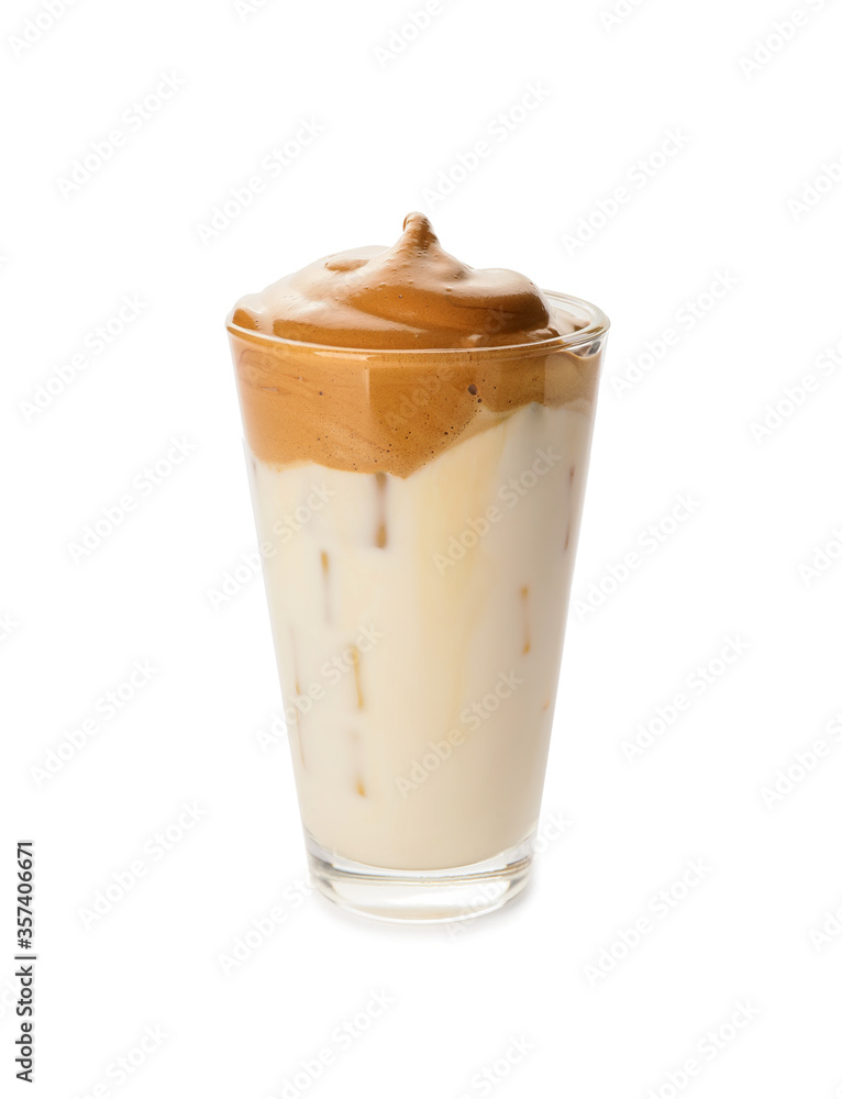 Glass of tasty dalgona coffee on white background Glass of tasty dalgona coffee on white background