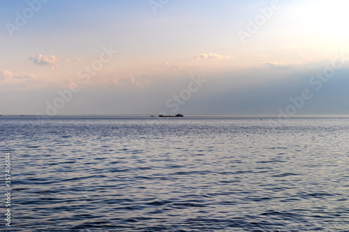 sea ship and sunset at sea © Anatolii