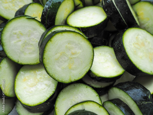 raw sliced zucchini slices . raw vegetables background