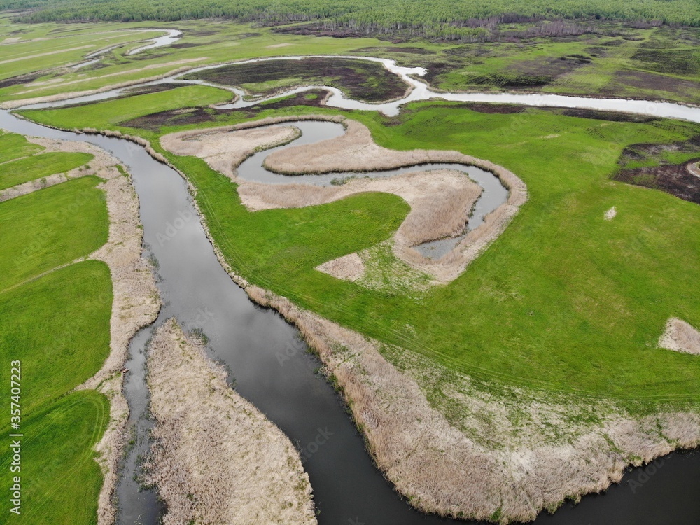 Top view of the meandering Biebrza river in Poland
