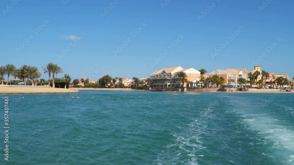 View from a floating ship. Buildings and beaches in El Gouna. El Gouna - a tourist resort on the Red Sea coast in Egypt View from a floating ship. Buildings and beaches in El Gouna. El Gouna - a tourist resort on the Red Sea coast in Egypt