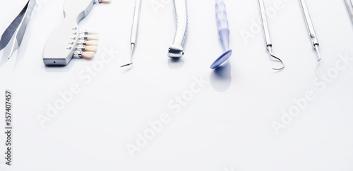 dental tools on white background with copy space