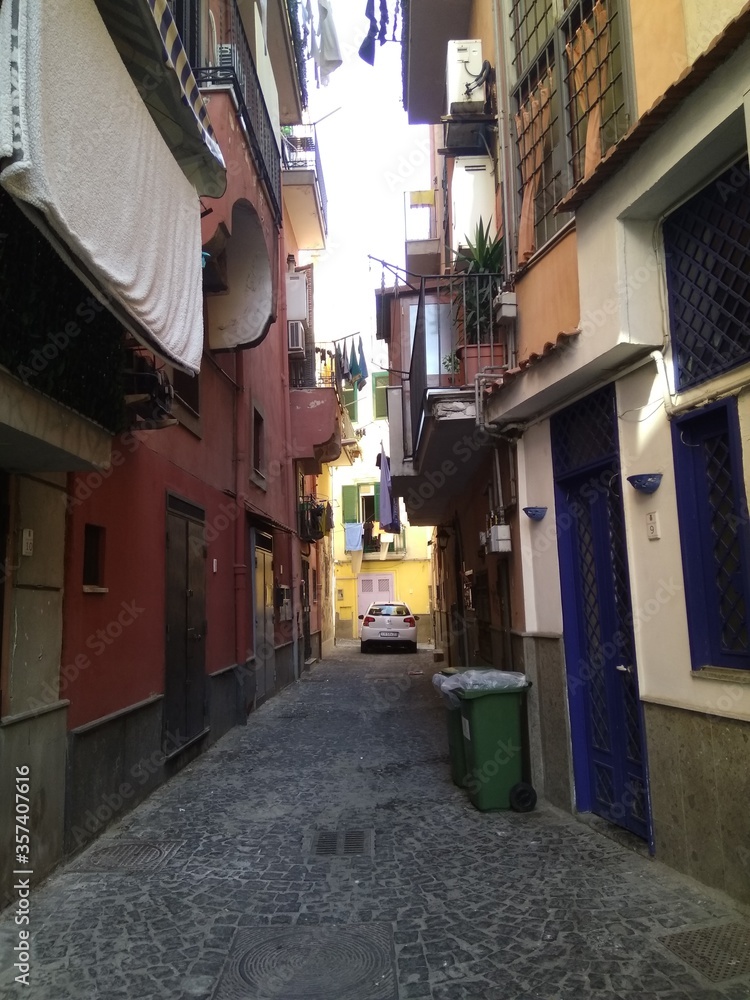 The street  in Pozzuoli, Italy.  The narrowing street conveys the atmosphere of southern Italy well.