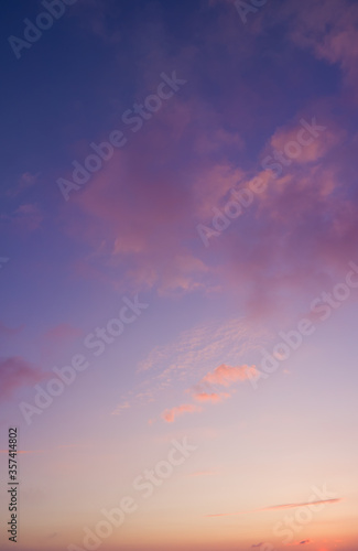 Photography Vertical photo of majestic colorful clouds in pastel tones