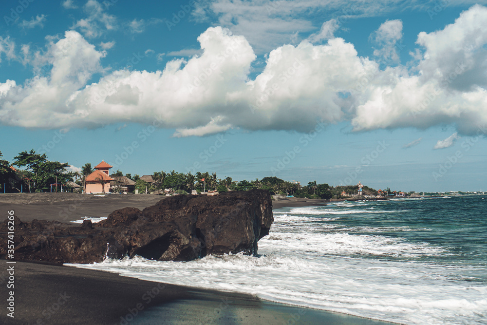 large waves crashing into large rocks on bali island large waves crashing into large rocks on bali island