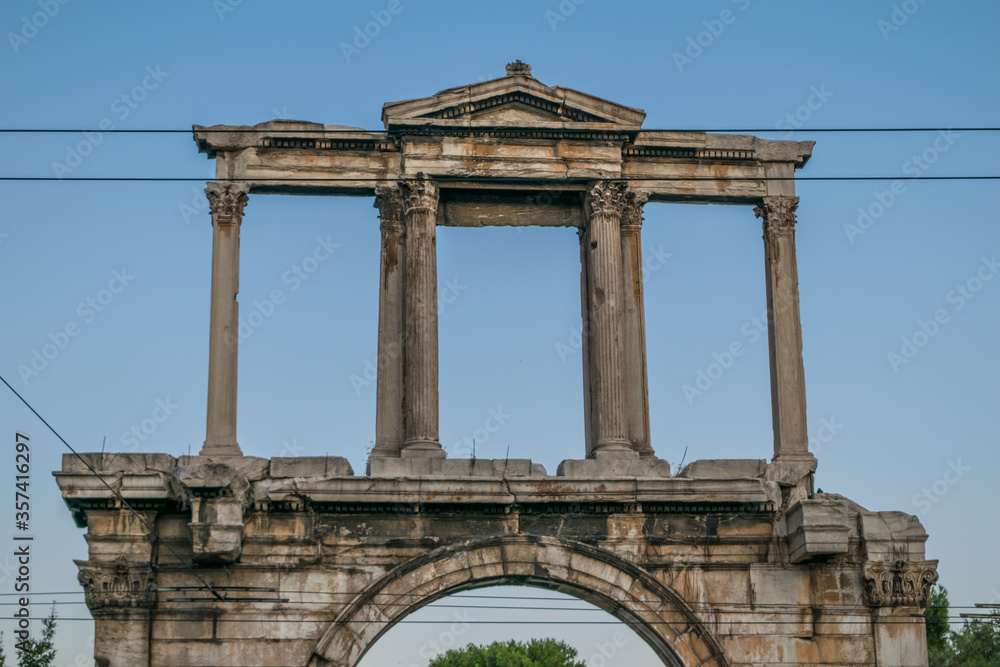 Arch-shaped marble-made Hadrian's Arch with Corinthian columns in Athens