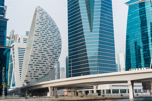 Modern skyscrapers in Dubai. Business bay district. View from water canal. Futuristic architecture. © Kateryna