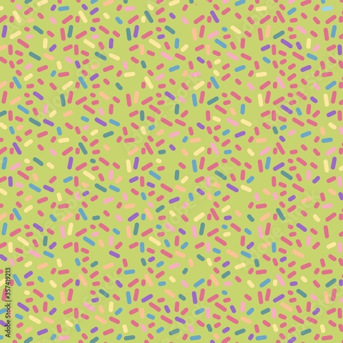 Sprinkles on green background