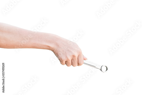 Hand holding a spanner isolated on a white background with clipping path.